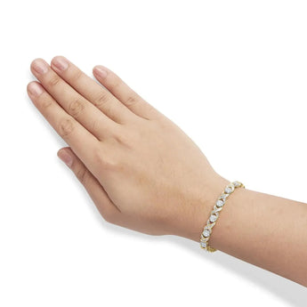 10K Yellow Gold 3.00 Cttw Round-Cut and Baguette-Cut Diamond 'XOXO' Floral Design 7.50" Bracelet (J-K Color, I1-I2 Clarity)